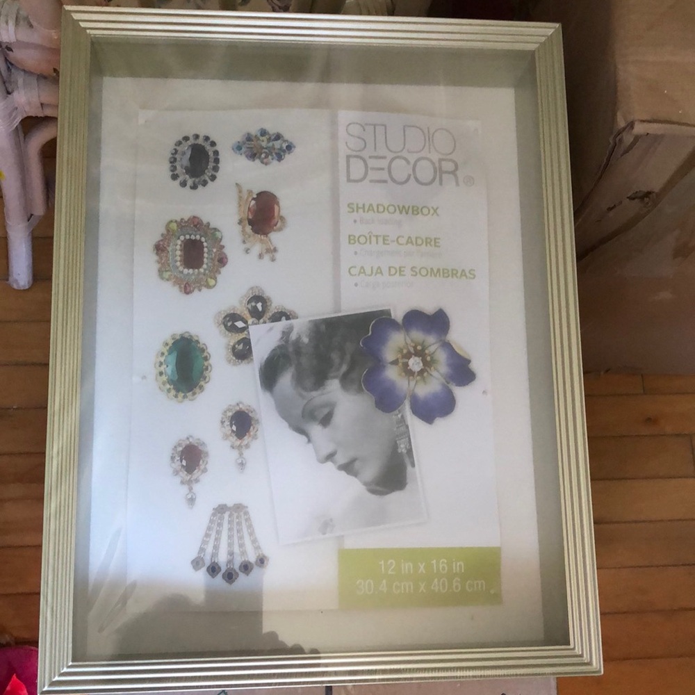 - Silver 12” X 16” shadow box